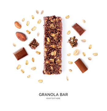 Creative layout made of chocolate granola bar on the white background.Flat lay. Food concept.
