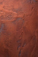 Textured vertical background. Decorative plaster imitates a rusty metal coating. Interior wall...