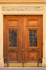 Paris, an old wooden door, typical building in the Marais
