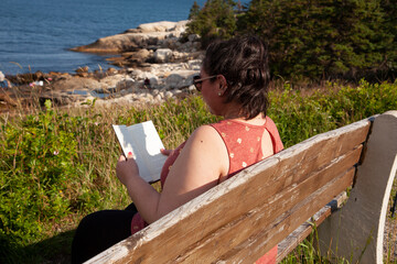 Summer read on the ocean