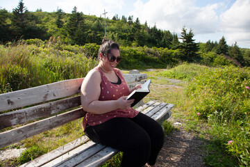 woman enjoying reading outside