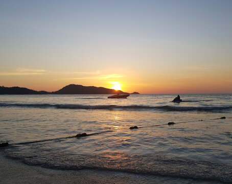 sunset over the sea in Pa Tong