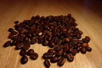 Coffee beans on the wooden table