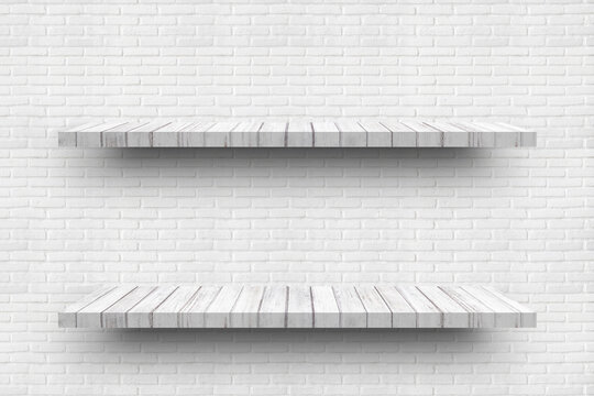 Empty two white wooden shelf on old white brick wall background texture for display products.