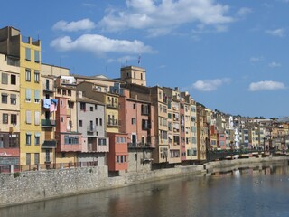 Fototapeta na wymiar Cityscape with colorful houses by the Onyar river in Girona, Catalunya, Spain