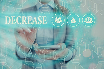 Text sign showing Decrease. Business photo text the process of growing progressively less in size,...