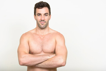 Fototapeta premium Portrait of handsome muscular Hispanic man shirtless