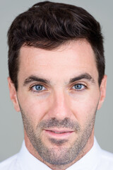 Obraz premium Face of handsome Hispanic businessman with beard stubble