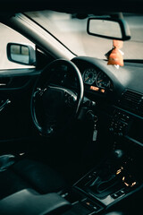 Interior shot of a car with a steering wheel