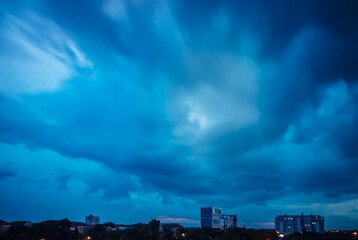 time lapse clouds over city