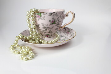Vintage teacup with pearls