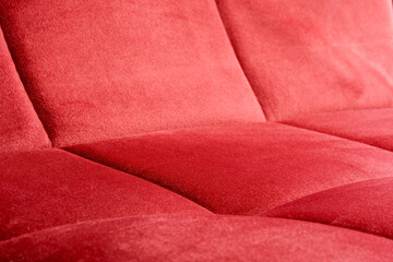 Close-up of a red velvety upholstery fabric