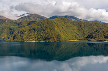 Reflection landscape of the Cuicocha Lagoon near Otavalo, north of Quito, Ecuador.