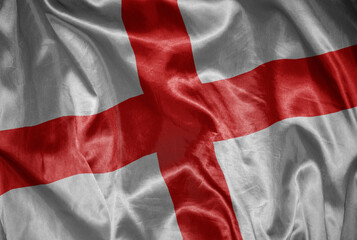 colorful shining big national flag of england on a silky texture.