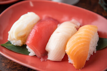 japanese nigiri sushi with plum blossom