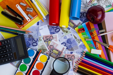 Colorful school supplies on white background with Turkish Money.School shopping concept