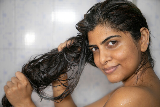 Indian Mexican Lady Bathing  Hair Wash Her Hairs Massaging Hair And Body With Hands Visible Soap Lather Water Dripping From Her Nude Body Posing With Smiling Face Posing Her Long Black Hairs In Corona