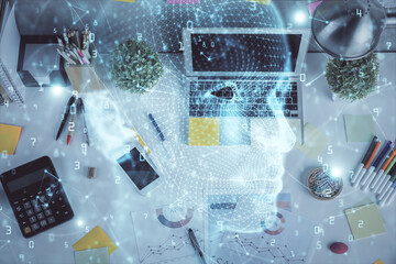 Multi exposure of brain sketch hologram over topview work table background with computer. Concept...