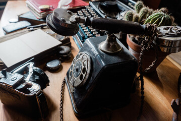 vintage phone and old typewriter