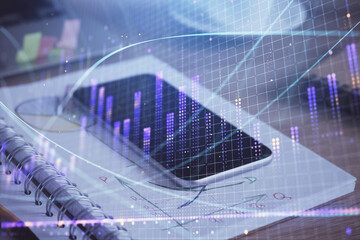 Double exposure of forex chart drawing and cell phone background. Concept of financial data analysis
