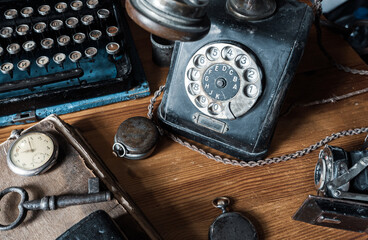 vintage phone and old typewriter