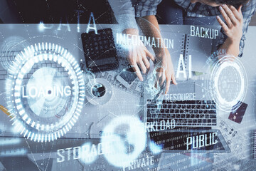 Double exposure of man and woman working together and data theme hologram drawing. Computer...