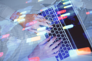 Double exposure of woman hands working on computer and data theme hologram drawing. Top View. Technology concept.