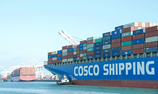 Oakland, CA - July 25, 2020: Cargo Ship COSCO AMERICA entering the Port of Oakland. China Ocean Shipping Company, COSCO&nbsp;is government owned by the People&rsquo;s Republic of China.