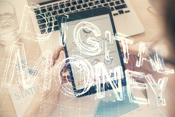 Double exposure of man's hands holding and using a phone and crypto currency blockchain theme drawing.