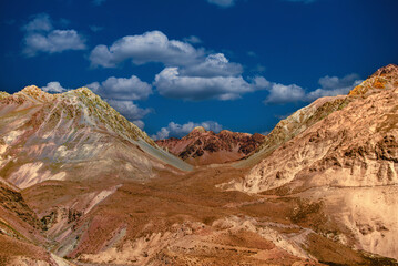 mountain landscape with blue sky in the Chilean Andes in late summer