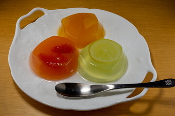 Three kind of fruit jellies (mango, grapefruit and lime)