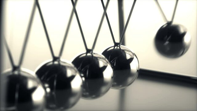 Seamless looping motion graphics with sound. Concept of conservation of momentum and energy.