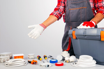 Electrician showing equipment for repair.