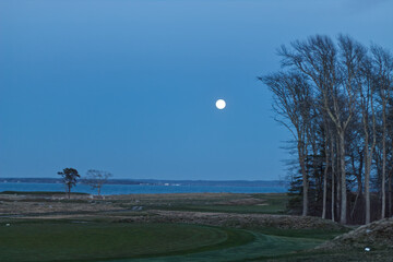 A full moon over the golf course