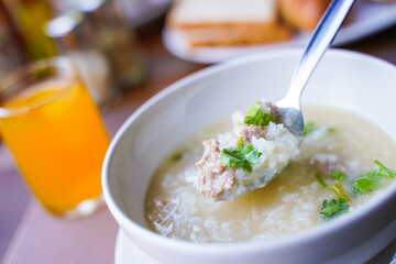 Boiled rice with pork for breakfast