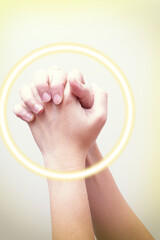 Praying hand sign, two woman's palm are clasped all together. with golden circle wave on hands hand language concept