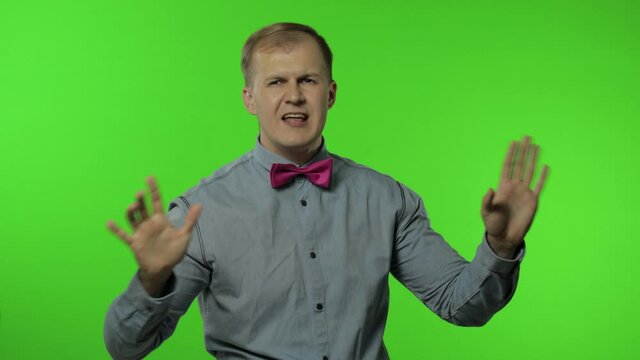 Handsome man moving in dance, smiling carefree, trends, gesture of success, celebrate. Chroma key