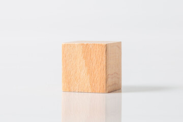 wooden geometric shapes cube isolated on a white background