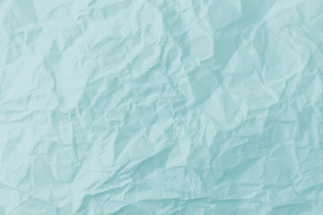 Top view of  blue crumpled paper background.
