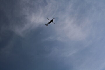Fototapeta na wymiar Helicopter in the ski