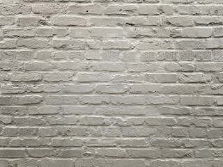 Glossy painted gray brick wall outside with cracks, holes and lines