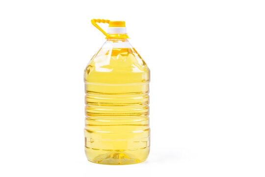 Plastic bottle of cooking oil with handle on white background