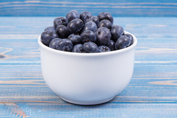 Fresh ripe blueberries containing natural minerals, healthy dessert concept