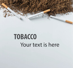 cigarette lay on heap of tobacco on white background from top view with copy space.