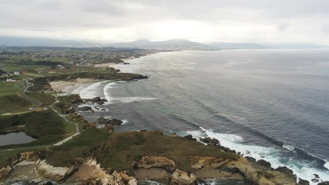 Beautiful beach of Galicia,Spain in cloudy day. Aerial Drone Video