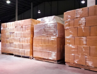 Stack of shipment boxes on wooden pallet. Cargo & shipping warehouse, Logistics and transportation.
