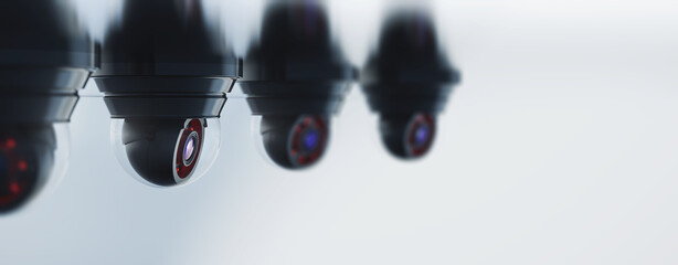 High key image of surveillance cameras in a row against a bright background (3D rendering, illustration)