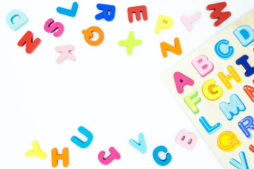 Colorful wooden educational abc toy puzzle for kids.