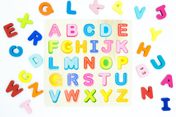 Colorful wooden educational abc toy puzzle for kids.