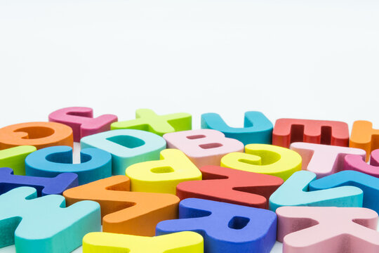 Colorful wooden educational abc toy puzzle for kids.